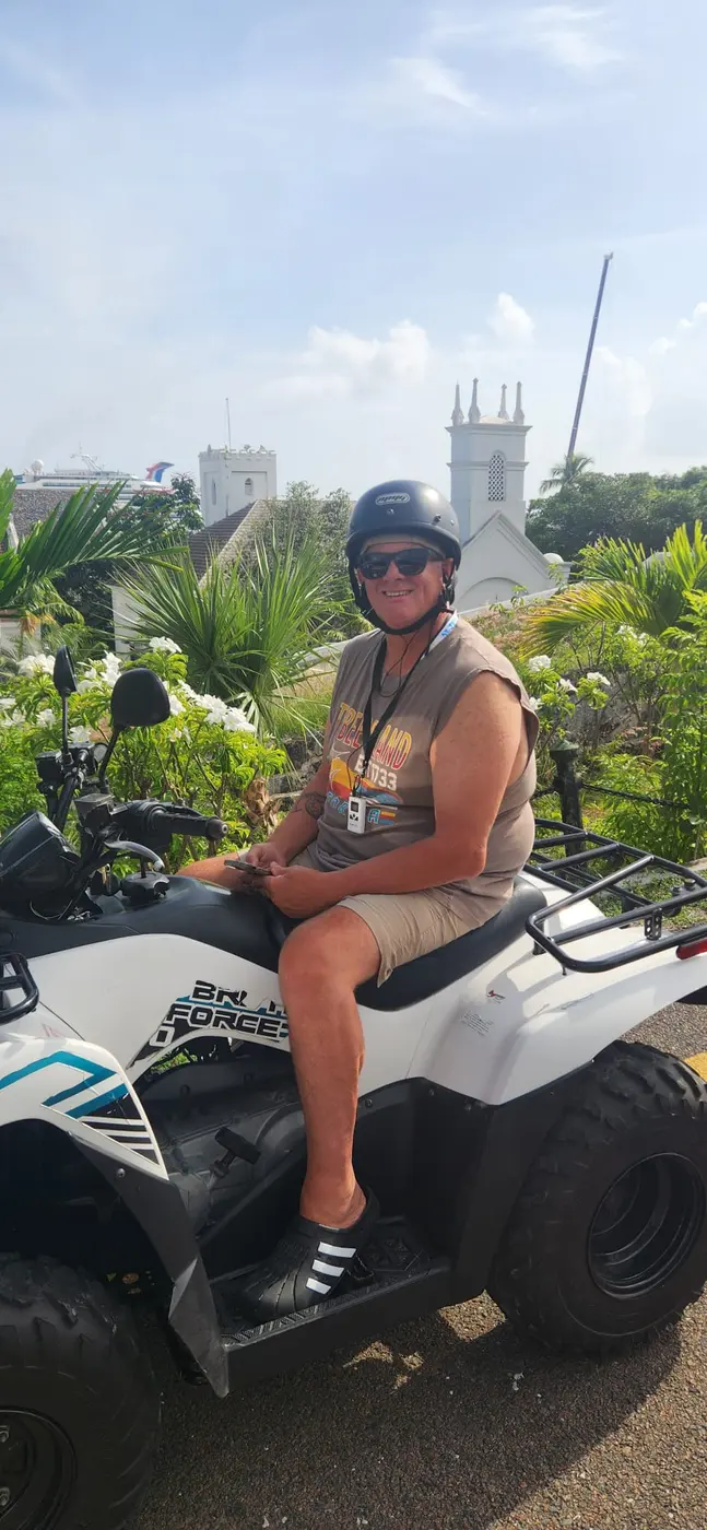 A guest on a white ATV