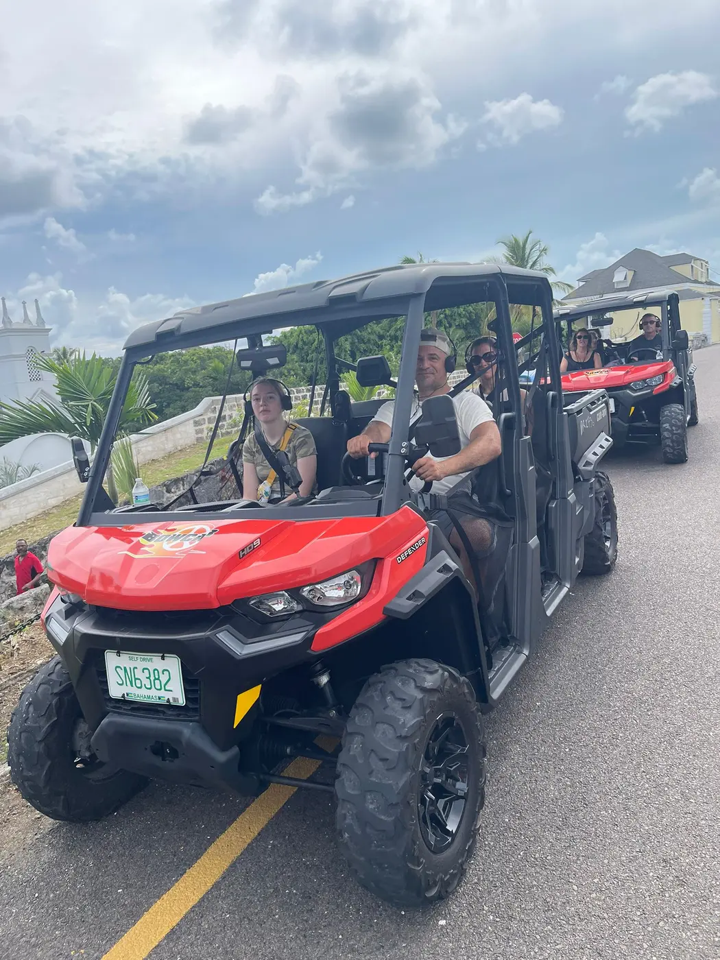 A red buggy with riders