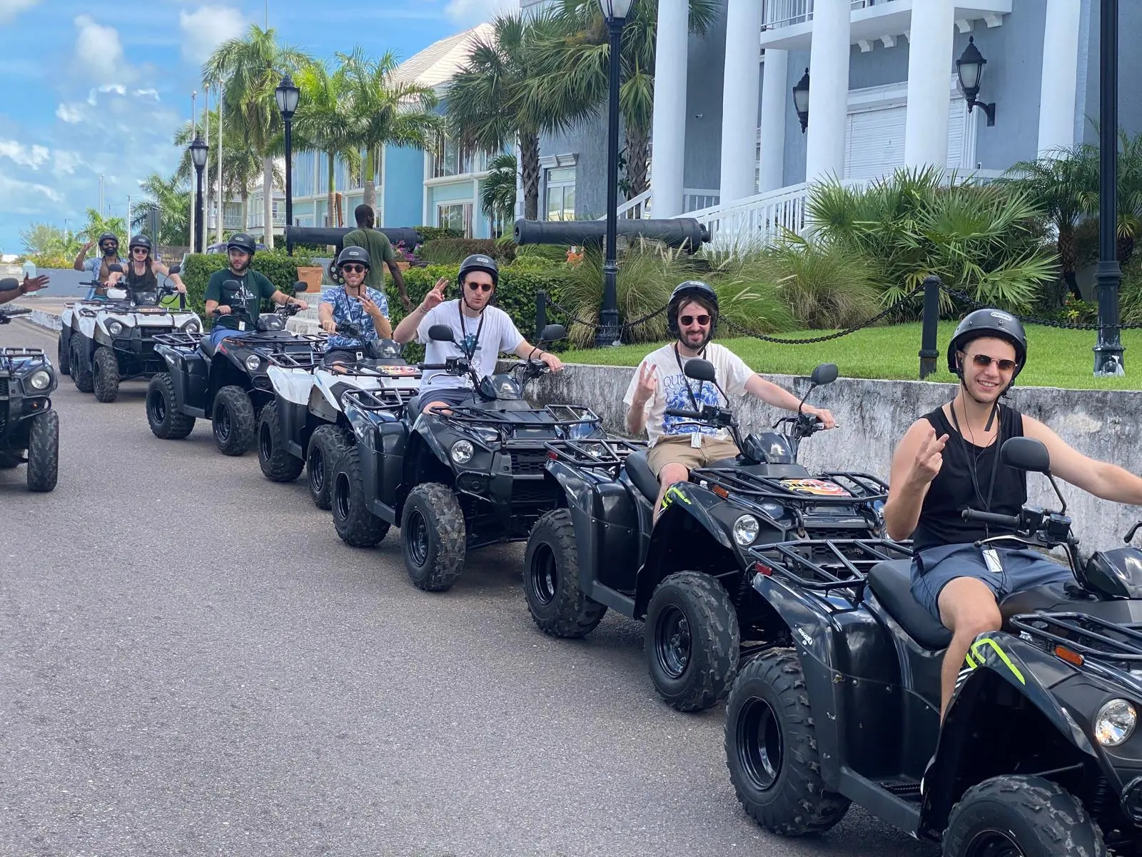 A line of Bowcar ATVs on a Nassau street