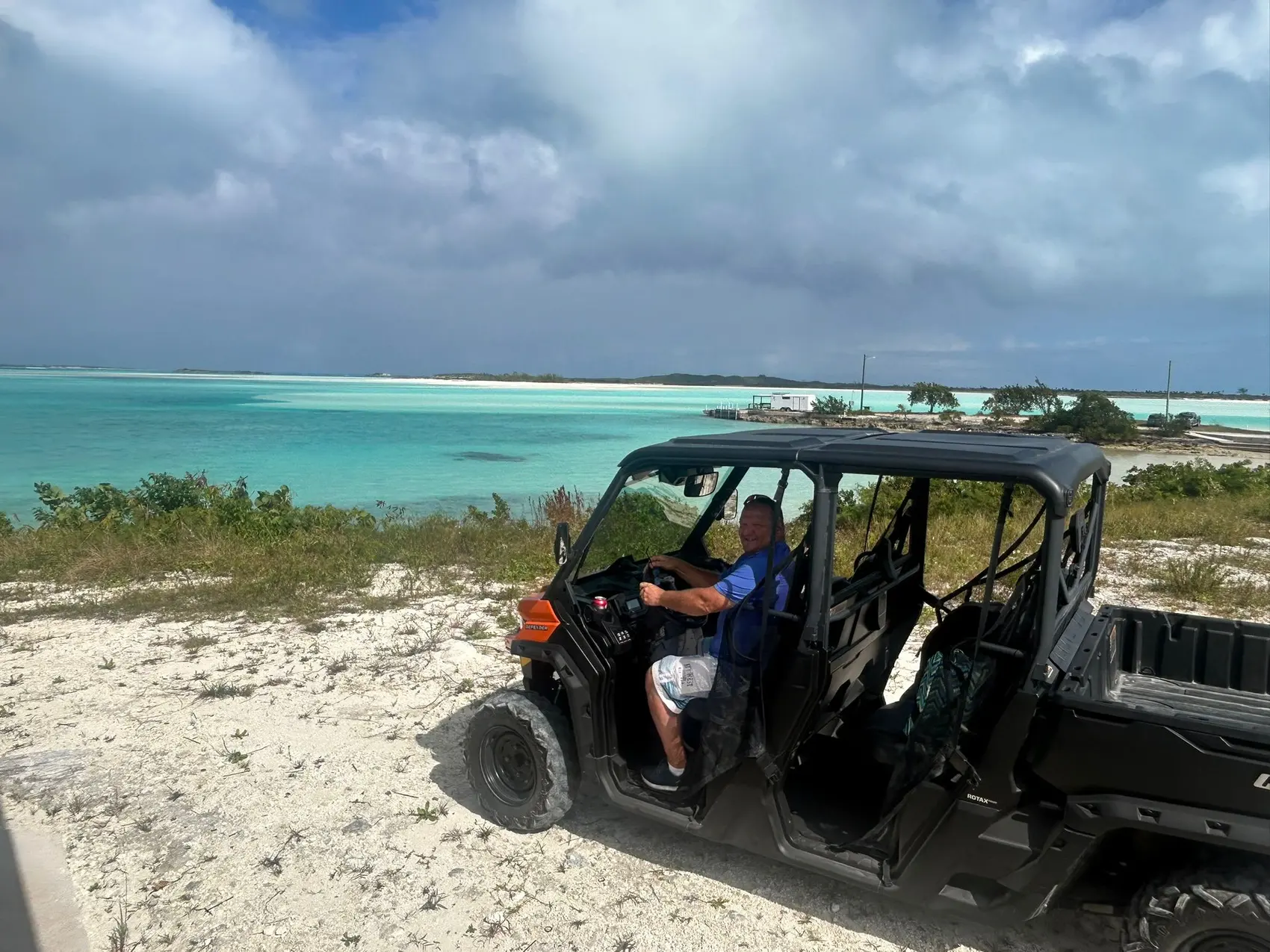 Guests in a buggy on the beach in Exuma